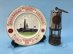 An Eccles miners lamp, together with a commemorative plate