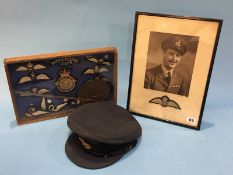 Collection of RAF cap and shoulder badges, a cap, a death plaque to Frederick Byrne etc.