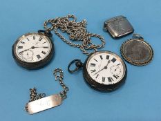 Two silver pocket watches, a vesta, chain and a mounted Crown