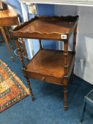 A reproduction mahogany Glenister two tier table