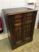 A small Ercol cabinet