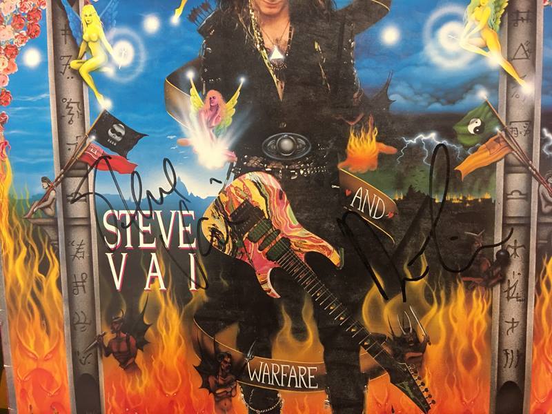 A box of heavy metal vinyl records, including a signed 'Steve Vai' album - Image 2 of 12