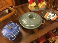 Three Le Creuset pans