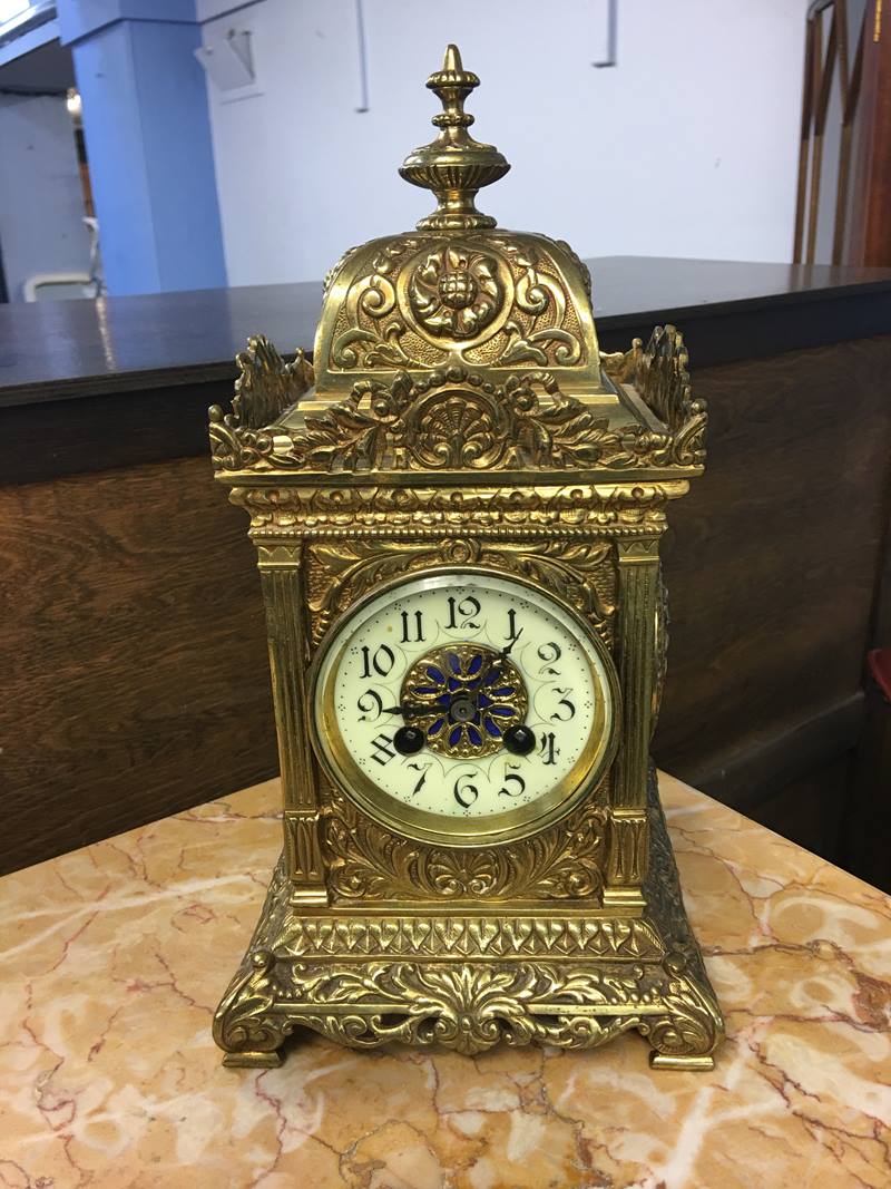 A brass mantle clock, with French movement