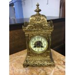 A brass mantle clock, with French movement
