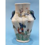 An Oriental vase, decorated with figures and elephant heads, six character mark to base 28cm high No