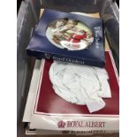 Box of commemorative and Christmas plates