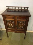 Edwardian mahogany and inlaid music cabinet