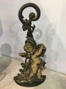 Cast cherub door stop