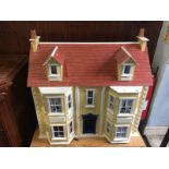 Dolls house and stand