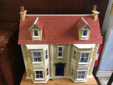 Dolls house and stand