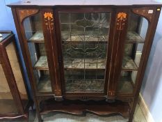 An Edwardian mahogany Art Nouveau china cabinet