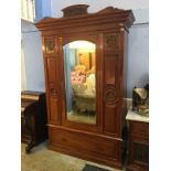 An Edwardian marble top washstand with tiled back and a mirror door wardrobe