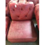 Red Chesterfield style chair