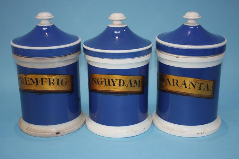 Three blue Chemist jars