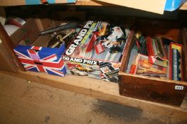 A shelf of miscellaneous, including Scalextric set and Triang railways