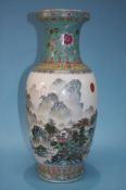 An impressive Chinese Famille Rose vase, decorated