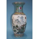 An impressive Chinese Famille Rose vase, decorated