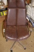 An R. M. of Norway chrome and brown leather swivel chair