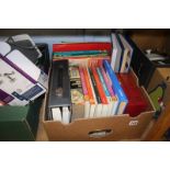 A shelf of miscellaneous, including books and china