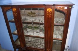 An Edwardian mahogany Art Nouveau china cabinet