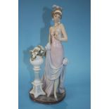A Lladro figure of a Lady in 1920's dress