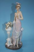 A Lladro figure of a Lady in 1920's dress