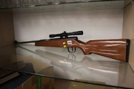 An air rifle and scope