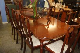Mahogany dining table and eight chairs