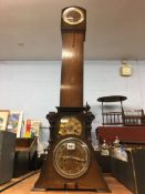 Three cased clocks