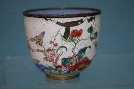 An 18th century Canton enamelled cup, 5.5cm high