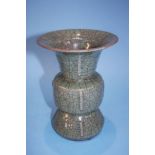 A Chinese Celadon crackle glaze octagonal vase with flared rim, 20cm high