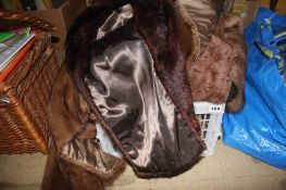 A box of Ladies fur/faux fur garments