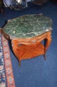 A Louis XV style oval occasional table with single