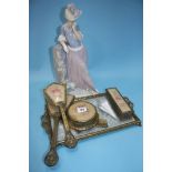 A Lladro figure and a dressing table set