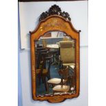 Bevelled edge mirror in decorative frame