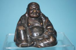 A bronze figure of a seated Buddha, 11cm high