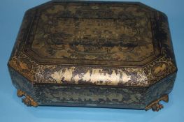 An Oriental lacquered work box, 37cm wide