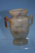 A jade two handled vase, 15cm high