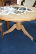 Circular dining table