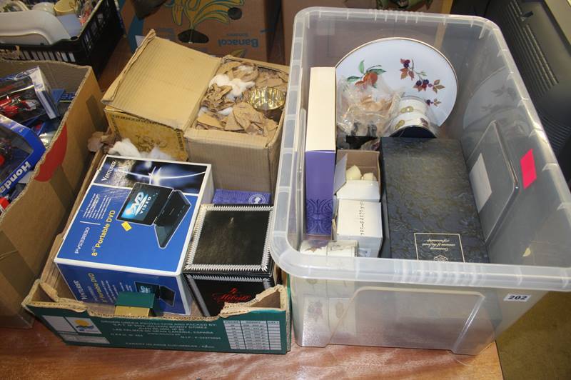 Two boxes of miscellaneous, including 8" portable DVD player