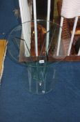 Single glass circular table