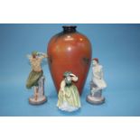 A large modern vase and three Doulton figures