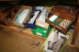 A shelf of ladies shoes and fur coat