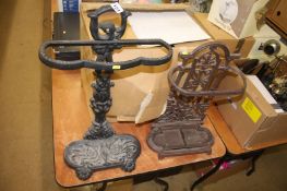 Two cast stick stands