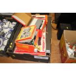 A box of Hornby electric train sets and accessories