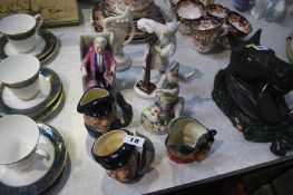 Various Royal Doulton figures, Toby jugs etc.