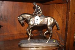 Figure of a jockey on a horse