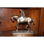 Figure of a jockey on a horse