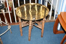 A brass top Benares table